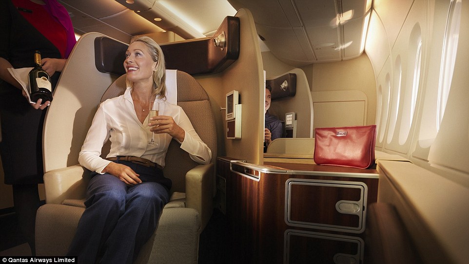 Passengers flying in Qantas' first class can expect privacy and space to stretch their legs and store their luggage. There is a bedding down service featuring pillows, blankets and a sheepskin mattress. There is also an ottoman to host a companion in your suite during the flight
