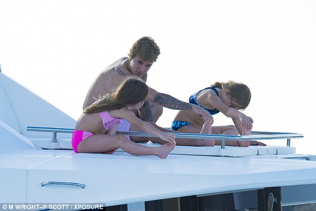  The two appeared to take to the discipline with ease as stretched their legs and touched their toes alongside their singer brother