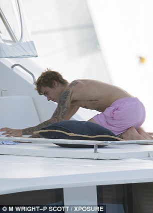  After showing his sisters a number of poses, Justin decided to continue on his own practice as he soaked up the last of the Barbadian sun