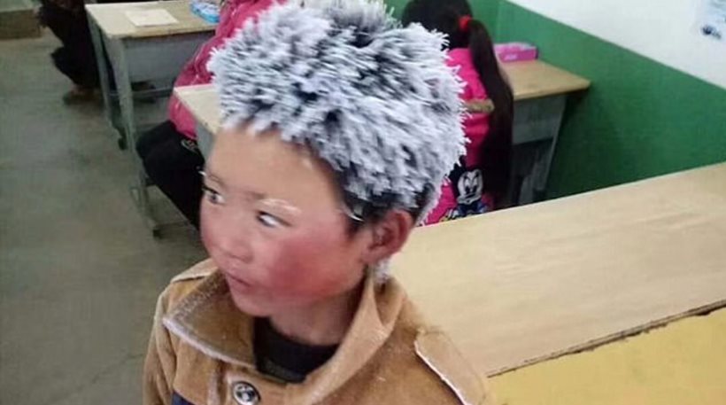Κίνα: Η φωτογραφία του 8χρονου που μάζεψε 280.000 ευρώ από δωρεές! (φωτό)