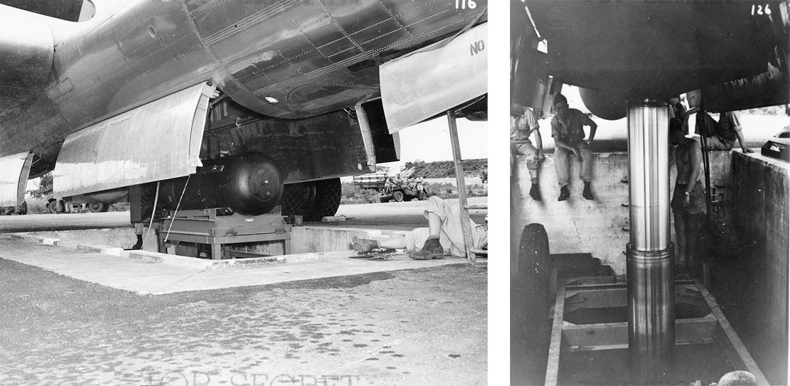 Using the hydraulic lift, "Little Boy" is carefully raised and loaded into the belly of the Enola Gay.