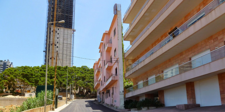 H ιστορία της πιο στενής πολυκατοικίας στον κόσμο (φωτο)