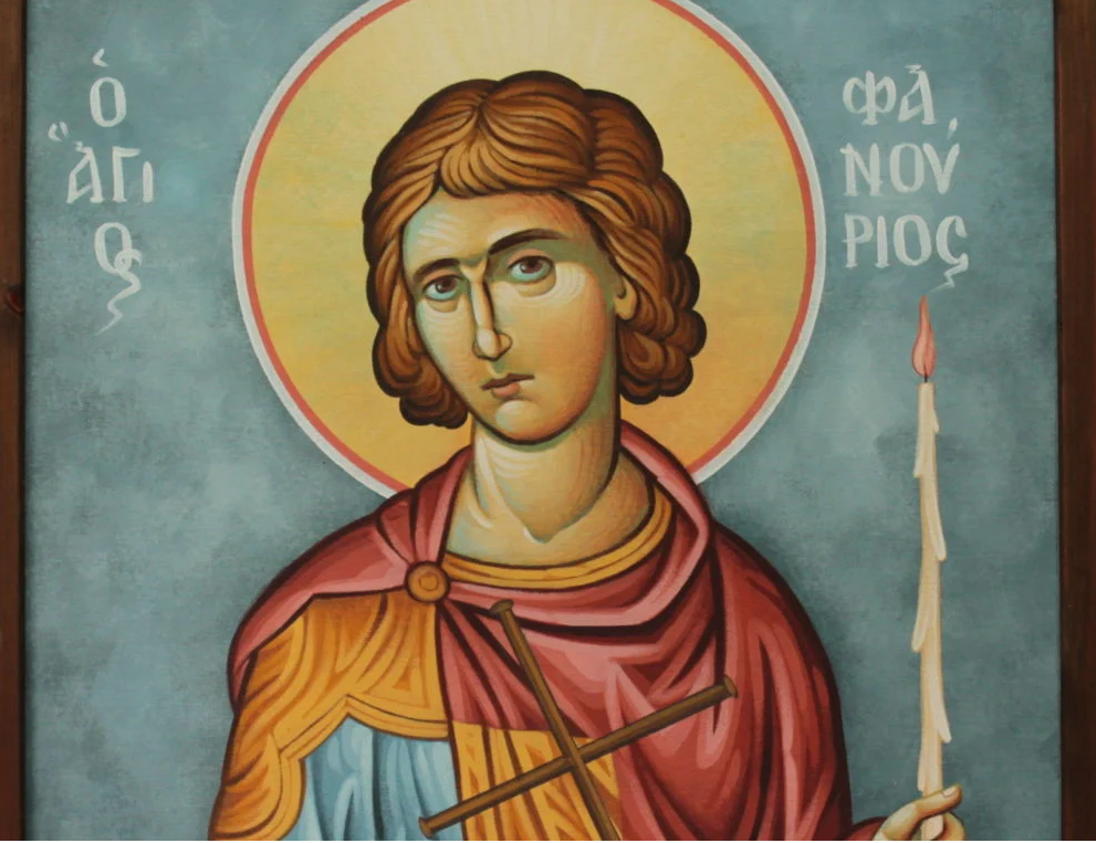 Για ποιο λόγο ο Άγιος Φανούριος απεικονίζεται να κρατά στο χέρι του ένα αναμμένο κερί;