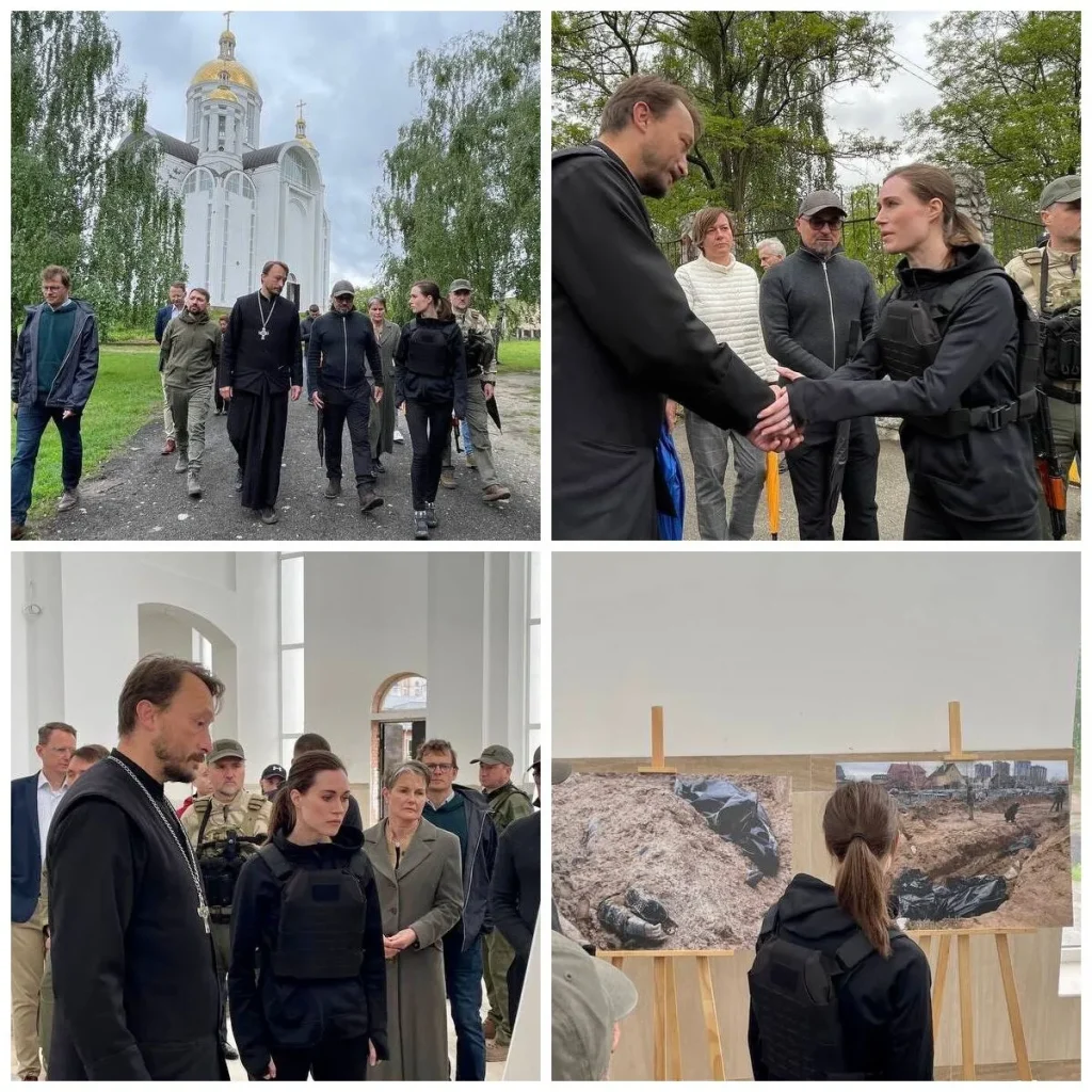 Η Σάνα Μάριν στο Ιρπίν και στο Μπούτσα με με μαύρα ρούχα και αλεξίσφαιρο γιλέκο