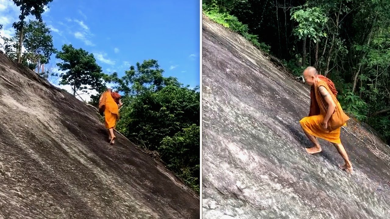 Βίντεο: Οι τουρίστες ανεβαίνουν την πλαγιά με σχοινί και ένας βουδιστής μοναχός σκαρφαλώνει με γυμνά πόδια!