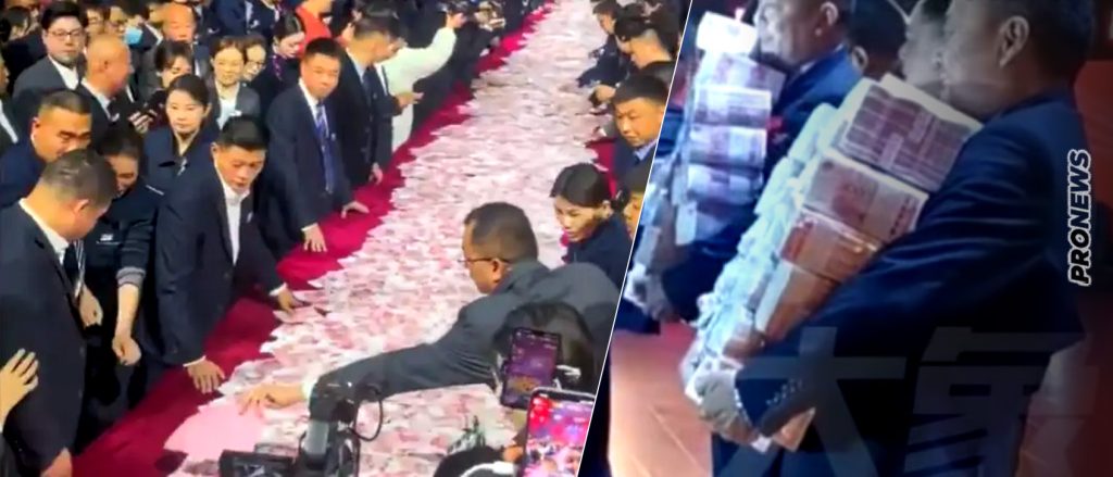 Απίστευτος εργοδότης στην Κίνα: Μοίρασε μπόνους 22 εκατ. ευρώ και τους έβαλε να πάρουν όσα χωρούσαν στα χέρια τους!