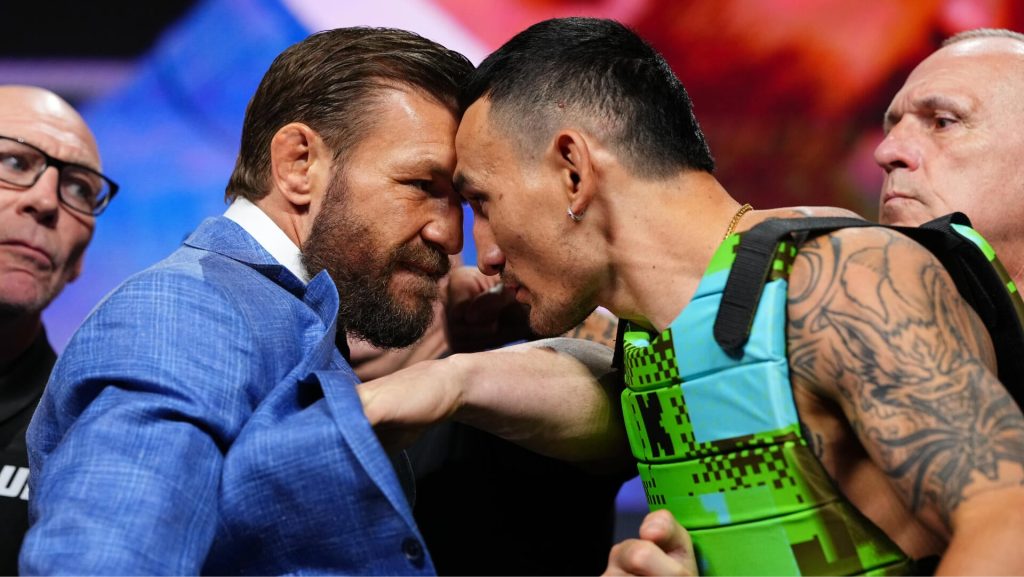 UFC 329: Επικό face-off ΜακΓκρέγκορ με Χόλογουεϊ – Εμφανίστηκε με… «κίτρινο γιλέκο μάχης» από video game